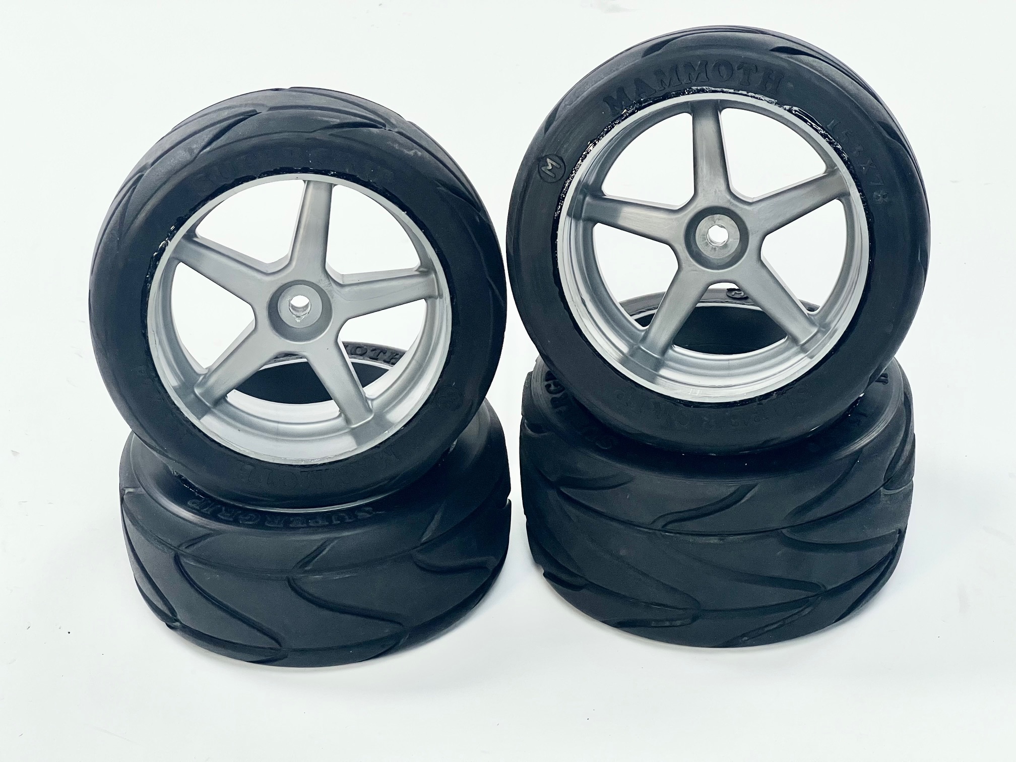 y0580/04 Mammoth Supergrip auf silberner Felge verklebt, Set 2 Paar