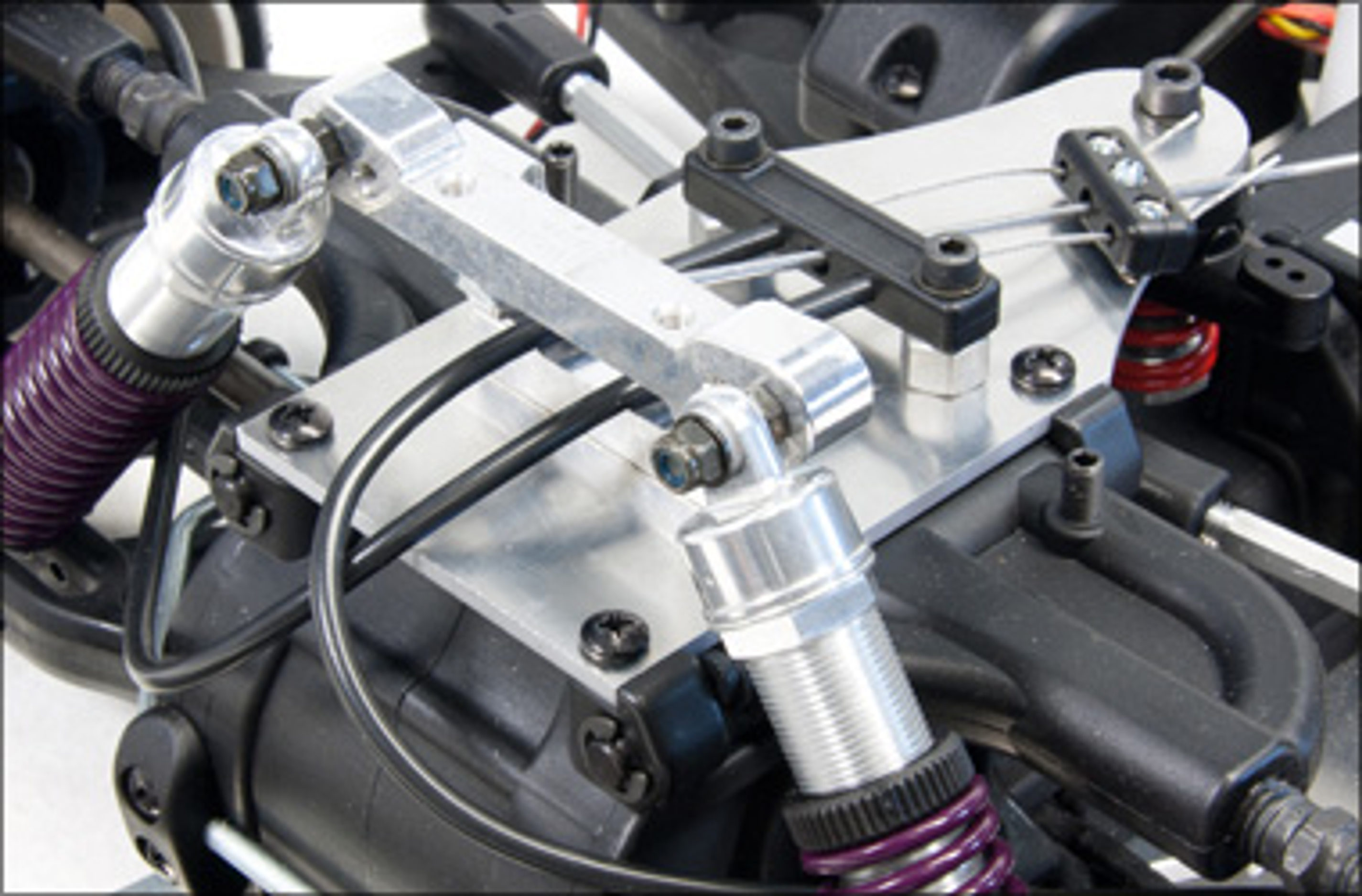 y0578 Alu-Stoßdämpferbrücke Front für FG Sportsline und Off-Road 4WD, 1 St. y0578 Alu-Stoßdämpferbrücke Front für FG Sportsline und Off-Road 4WD, 1 St.