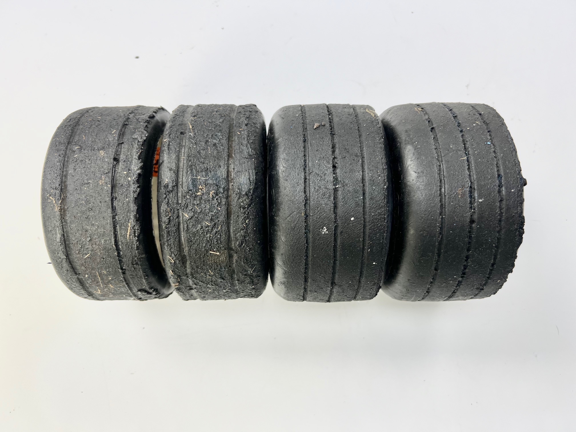 GRP Formula 1 tyre set glued on white GRP rim, used "5"