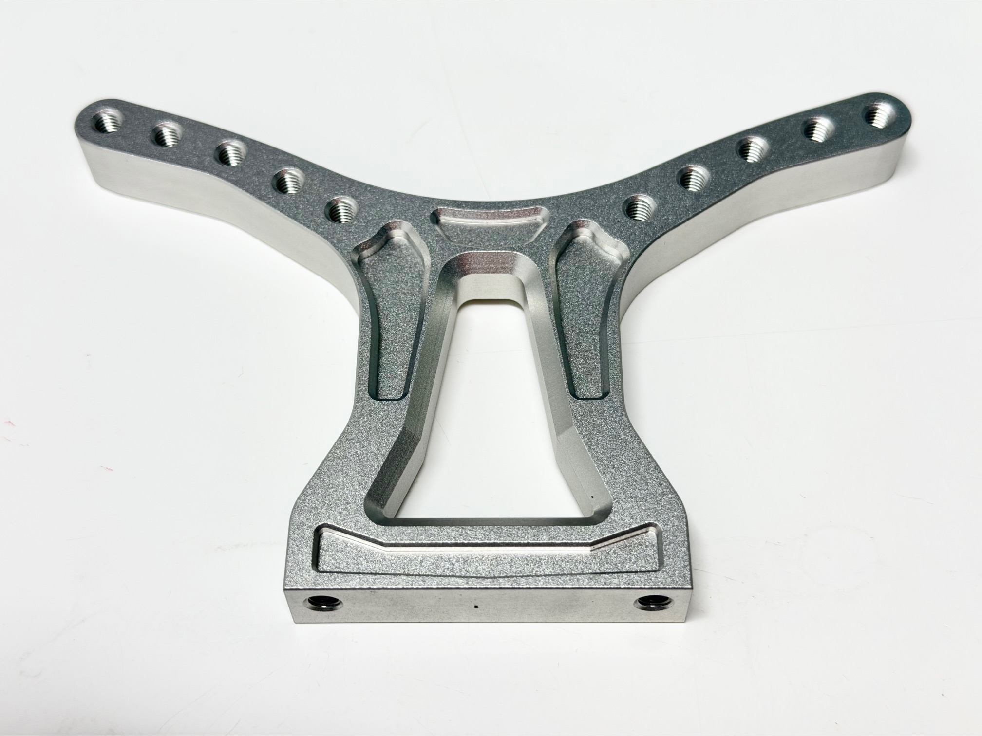 67289 FG Front shock absorber bridge Leo, 1 pc