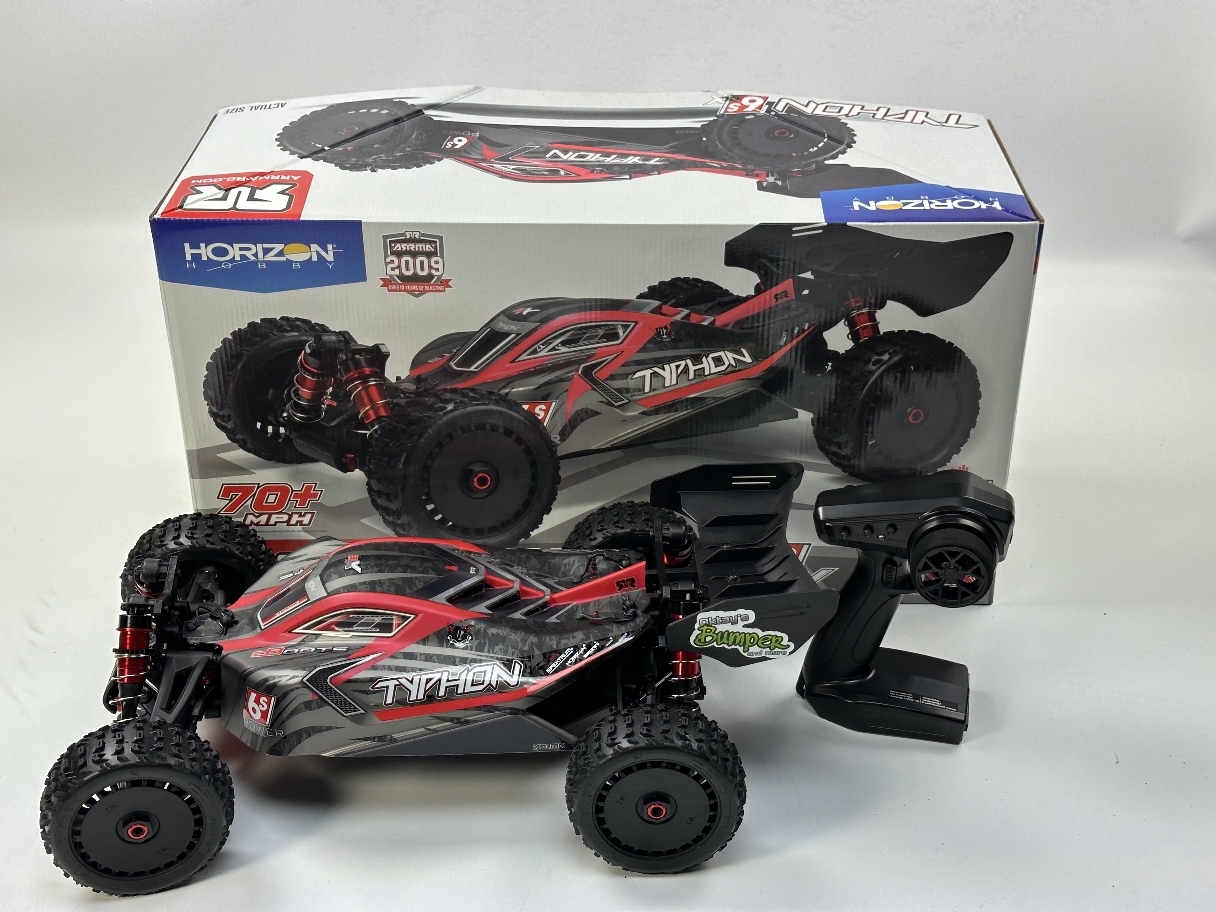 ARA8606V5 1/8 TYPHON 6S V5 4X4 BLX Buggy mit Spektrum Firma RTR, schwarz , neu und ungefahren